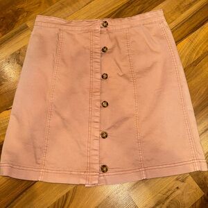 Listicle women’s skirt size large button up front peachy pink color‎